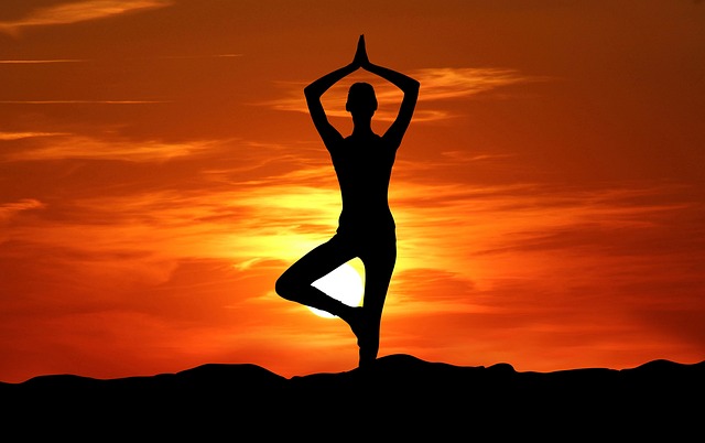 active individual performing yoga mobility pose with correct alignment and calm breathing